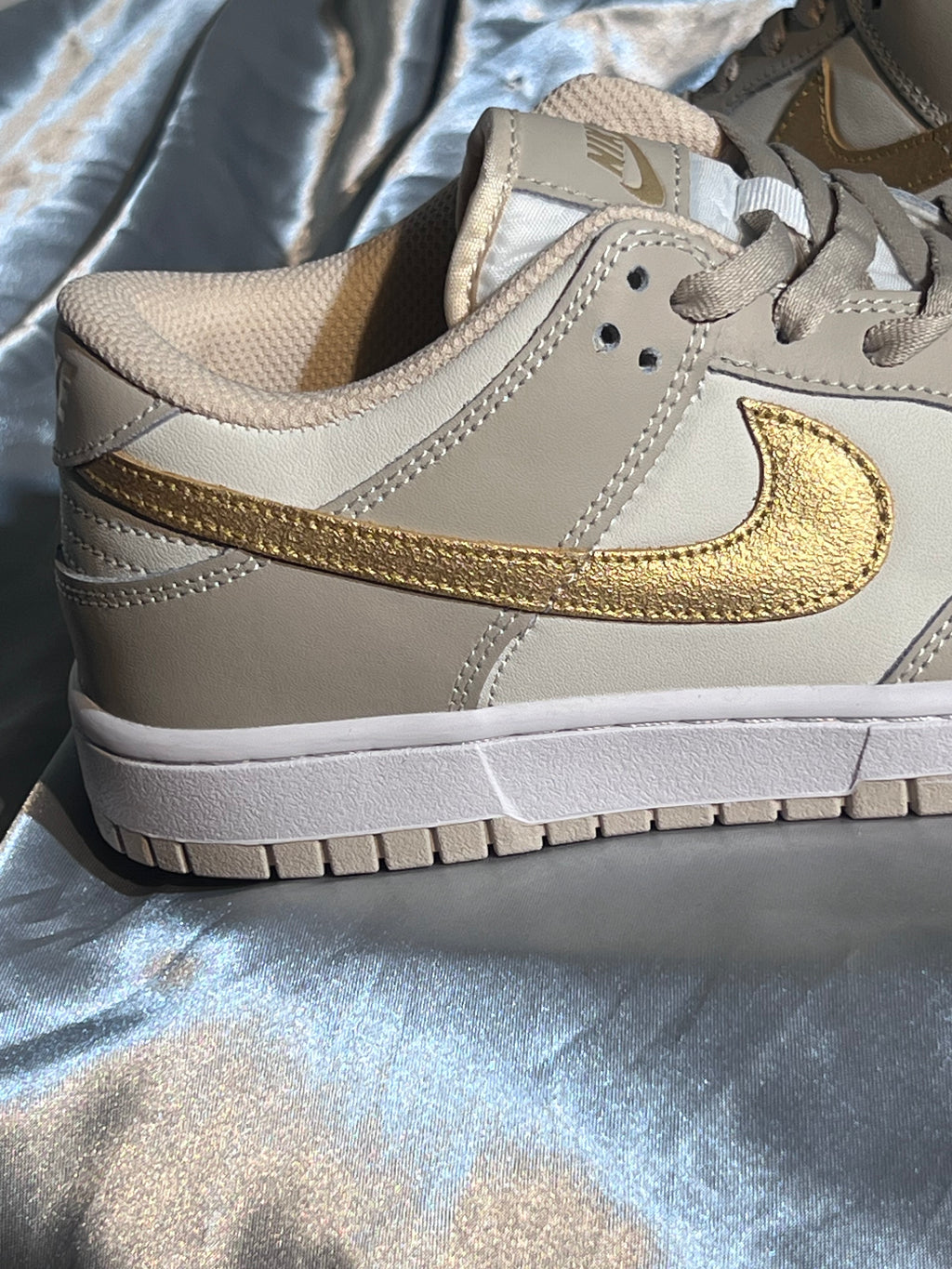 Nike Dunk Low “Swoosh Gold”